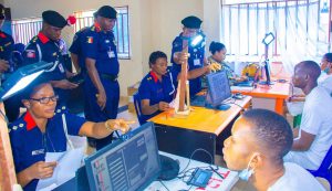 Nscdc officials attending to applicants 